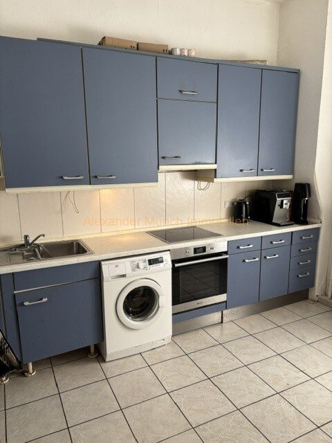 Niedernhausen-Vermietetes Dreifamilienhaus mit ausbaufähiger Scheune in Königshofener Kernlage!